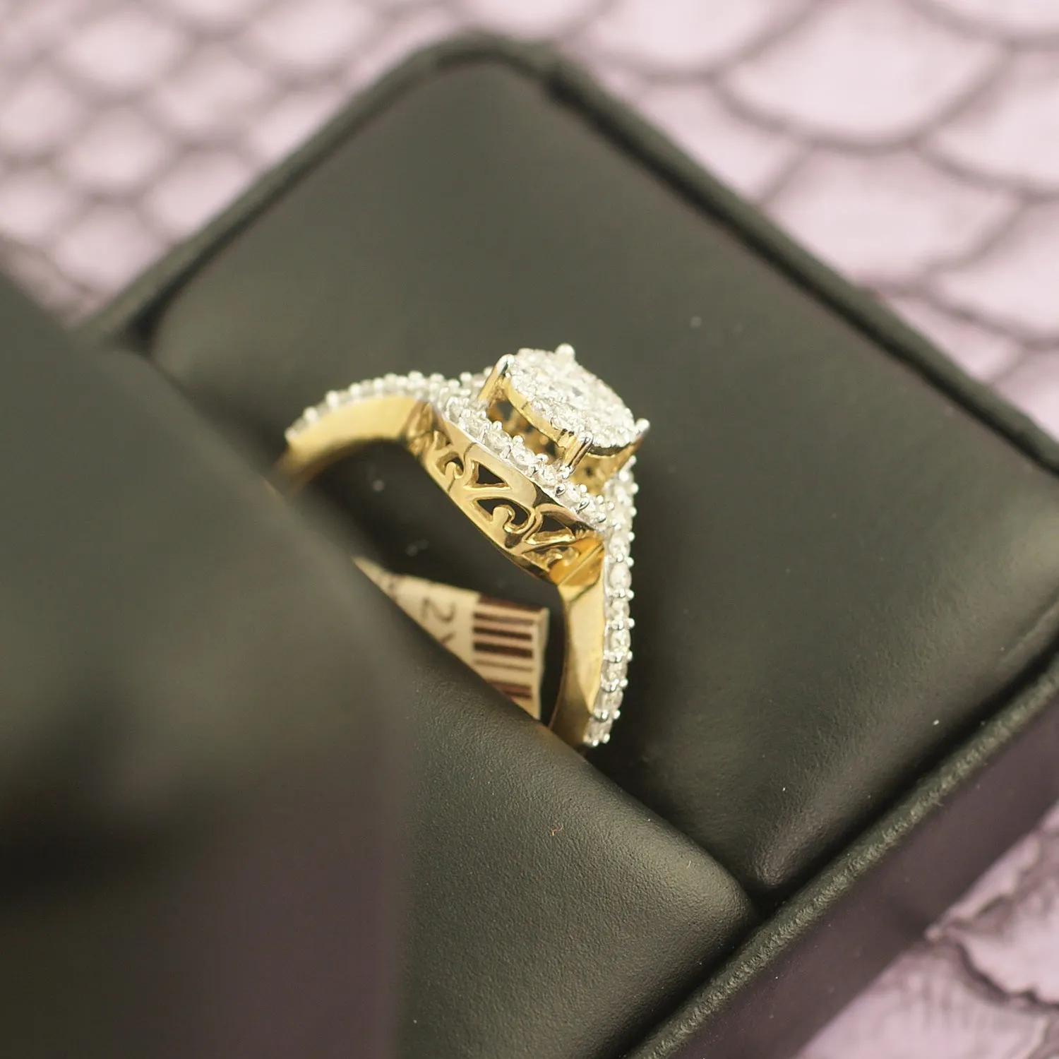 10K Gold 0.50 Carat Swirl Halo Diamond Ring