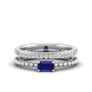 Emerald Cut East-West Sapphire and Diamond Ring