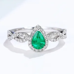 Pear Cut Emerald Ring with Diamond Halo