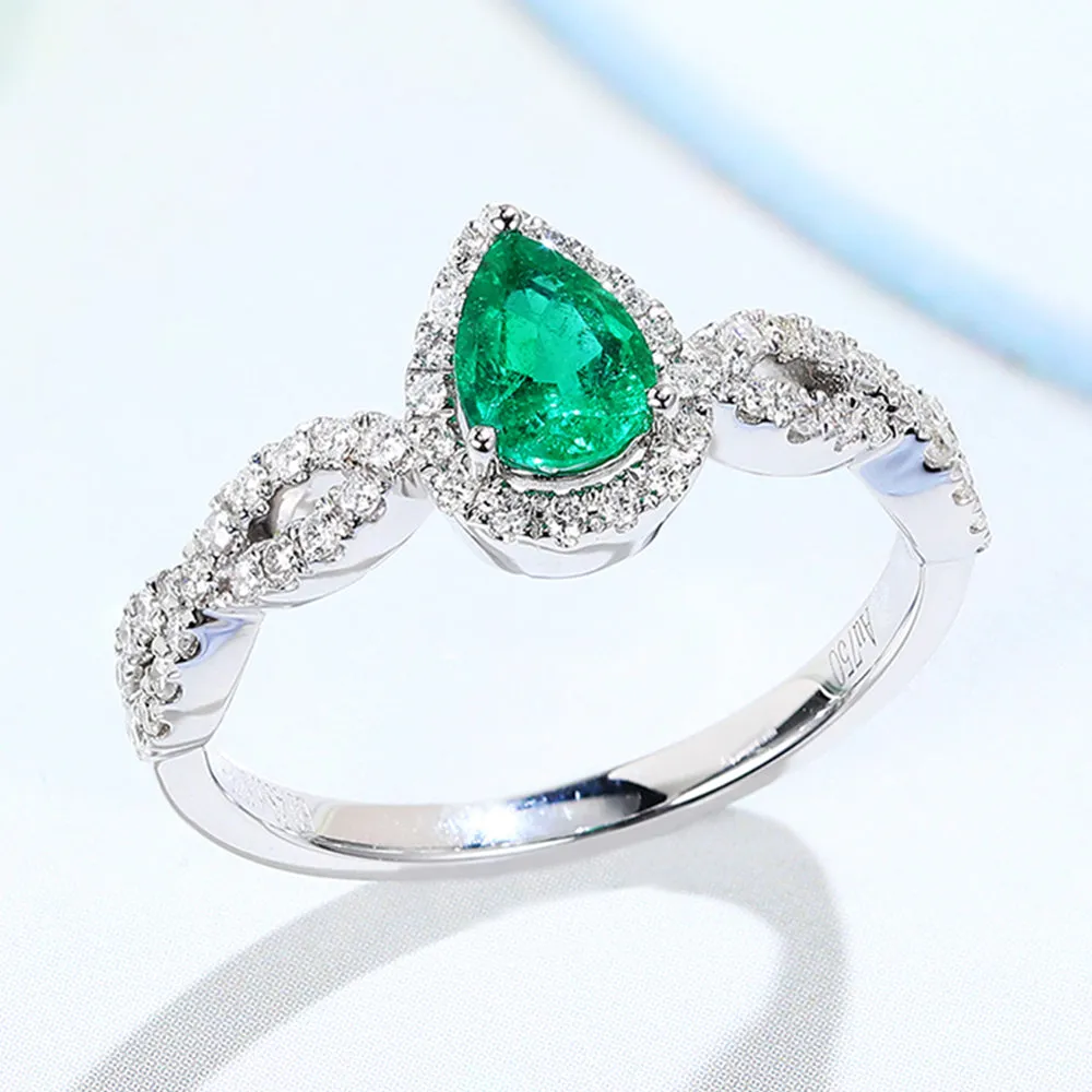 Pear Cut Emerald Ring with Diamond Halo