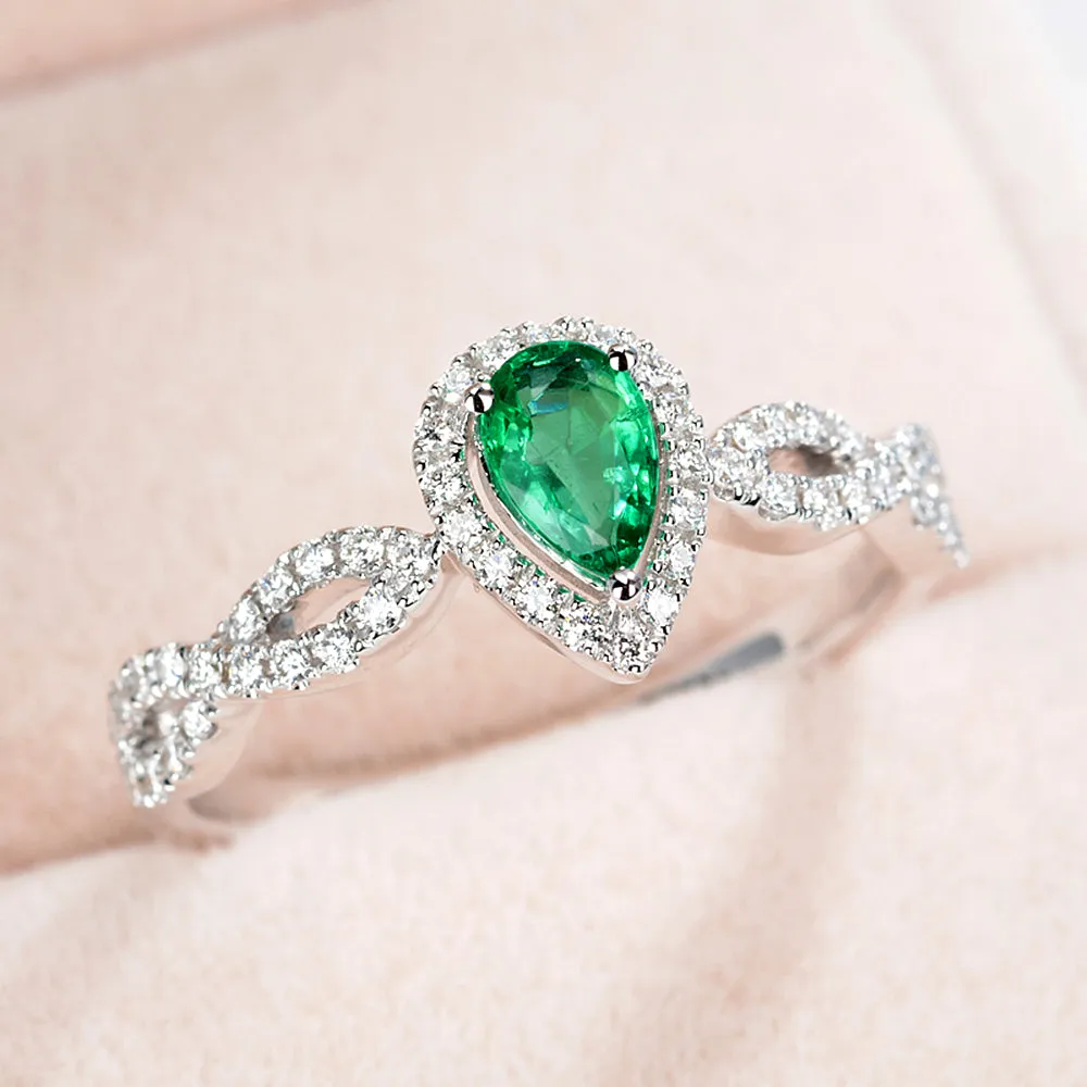 Pear Cut Emerald Ring with Diamond Halo
