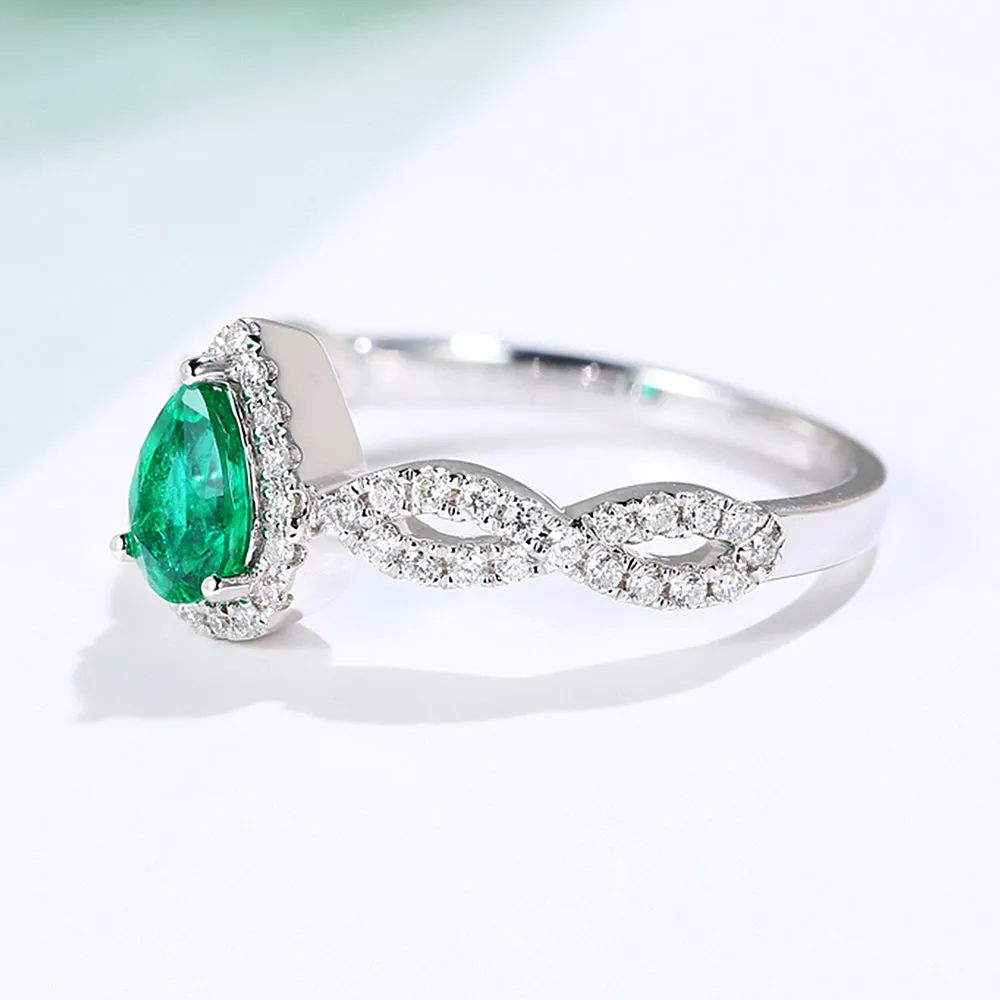 Pear Cut Emerald Ring with Diamond Halo