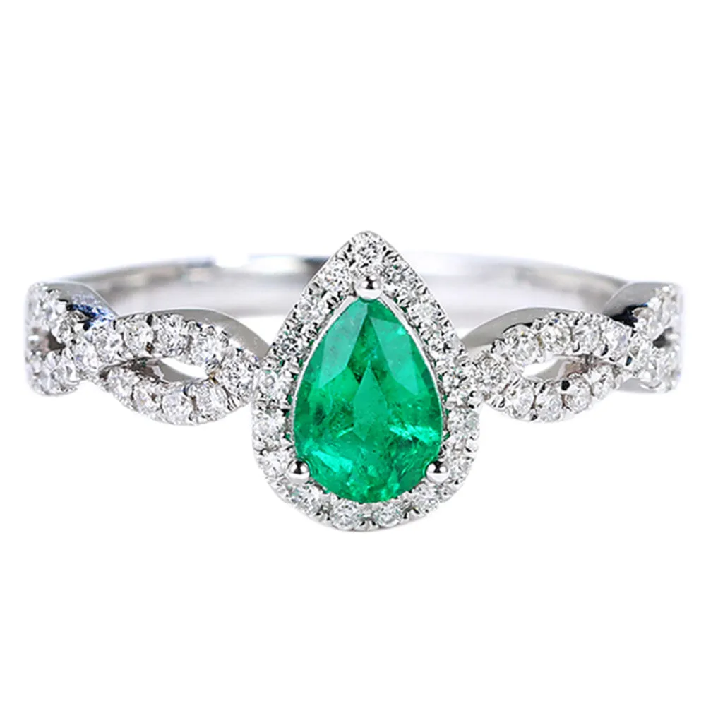 Pear Cut Emerald Ring with Diamond Halo
