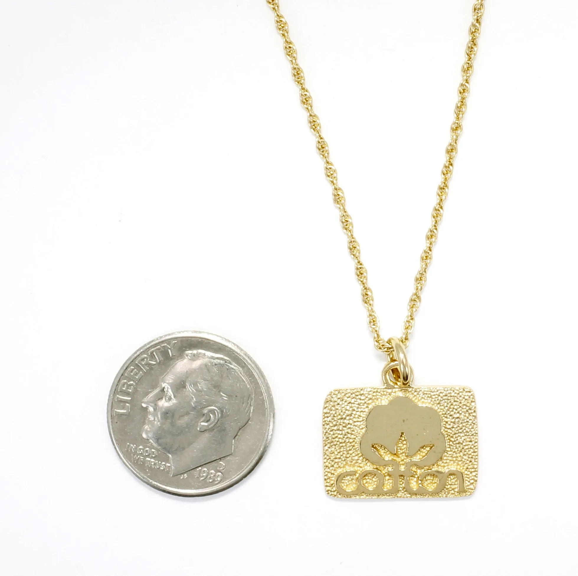 Small Gold Cotton Inc Necklace with Seal of Cotton Logo
